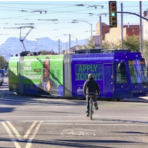 A streetcar and bicyclist
