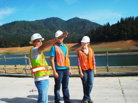 A CalTrans engineer leads Oregon Tech students on a tour of the new Antlers Bridge site at the Sacramento River arm of Lake Shasta Sept. 28.