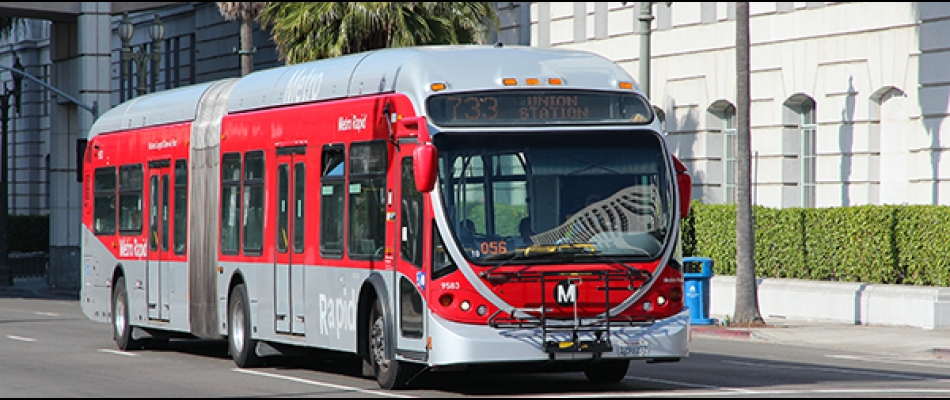 A bus pulls up to a stop